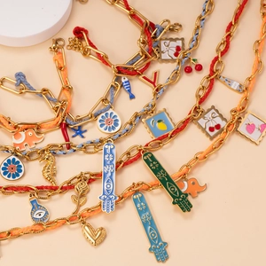 Colorful Hamsa Hand and Elephant pendants on braided stainless steel gold necklaces