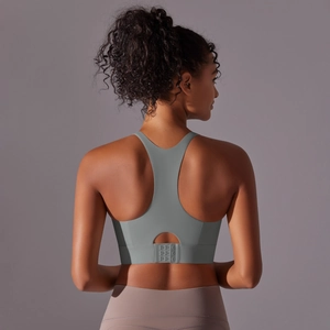 Soutien-gorge de sport gris sans couture avec dos nageur et agrafes réglables pour yoga