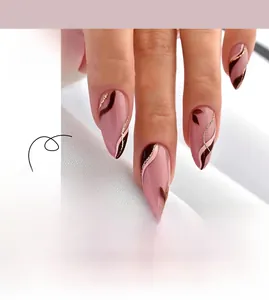 Pink and brown wavy art design on long almond press-on nails with gold glitter accents