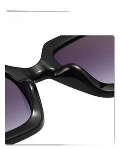 Detail of comfortable silicone nose pads on black square sunglasses with purple gradient lenses