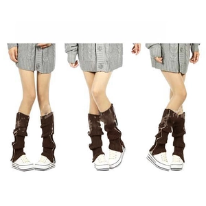 Detailed views of coffee-colored knitted leg warmers featuring a vertical metal zipper design