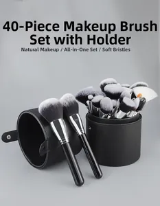 Detail of 40-piece professional makeup brush set with black storage bucket and soft bristles