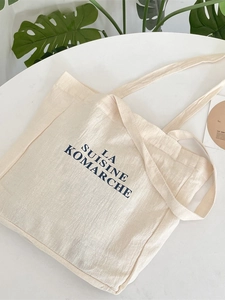 French style minimalist beige canvas tote bag with blue letter print for daily shopping