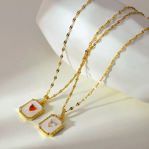 Elegant gold necklaces with heart-shaped gemstones in rectangular frames for women