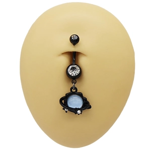 Macro shot of black moon belly ring with light blue heart gemstone on silicone model