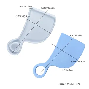 Detailed view of silicone tray mold and light blue resin product for Valentines DIY