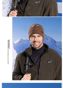 Close-up of winter knit beanie with mountain pattern and fleece lining for outdoor warmth
