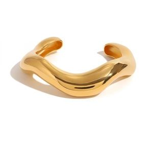 Minimalistischer goldener wellenförmiger Armreif aus hochglanzpoliertem Edelstahl
