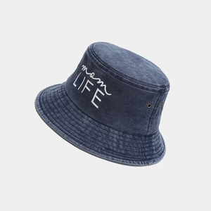 Detail of vintage washed denim bucket hat with white mom LIFE embroidery and metal eyelets
