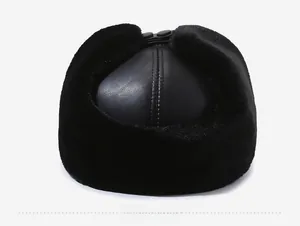 Rear view detail of men's winter thermal hat featuring thick black faux leather and plush fur