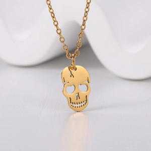 Minimalist laser-cut gold titanium steel skull pendant necklace for women in high polish