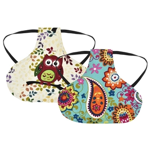 Detail of printed chicken saddles with owl and paisley patterns for feather protection