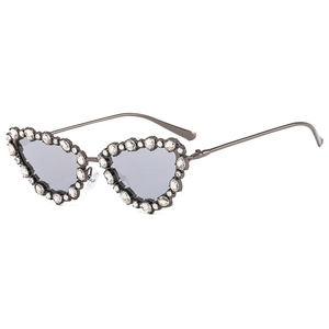 Luxurious cat-eye sunglasses with heart-shaped crystal-studded frame and grey lenses
