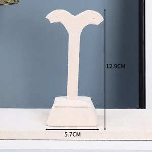 Detailed view of a beige velvet T-bar earring display stand with height of 12.9CM