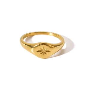 Retro gold plated stainless steel ring featuring a minimalist starburst engraving