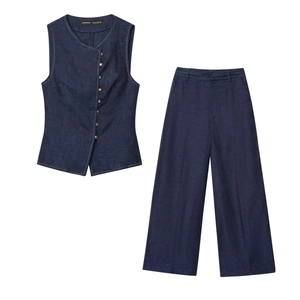 Women's two-piece dark blue denim vest and wide-leg trousers set in flat lay display