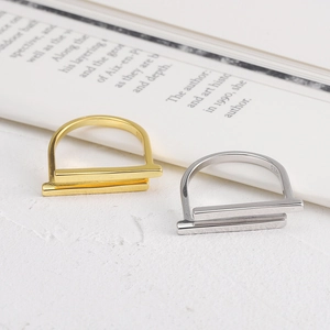Macro shot of S925 sterling silver stamp on minimalist geometric T-shape open ring