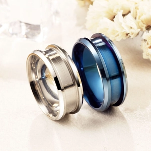 Macro view of 8mm stainless steel ring cores with grooved edges in silver and blue