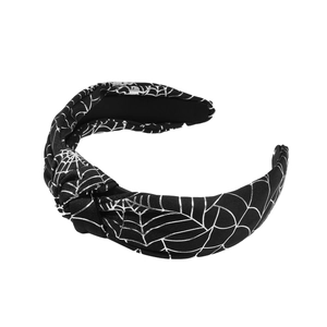 Black knotted headband with silver spider web patterns and elegant pearl accents