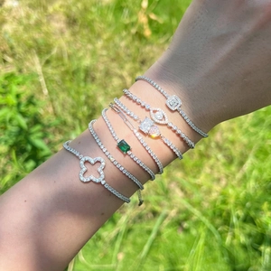 Elegant set of seven S925 sterling silver tennis bracelets with four-leaf clover charms