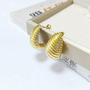 Polished 18K gold plated stainless steel croissant hoop earrings with textured spiral design