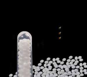 Detailed view of medical grade resin granules for vampire teeth adhesive and repair
