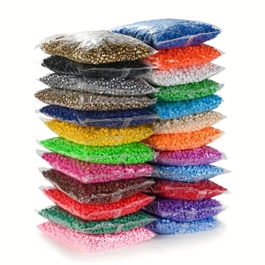Macro detail of assorted colorful transparent and frosted DIY pony beads in bulk bags