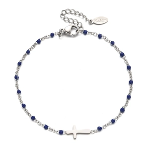 Detail of silver stainless steel bracelet with dark blue beads and cross charm closure