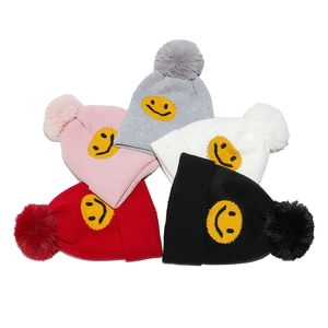 Winter knitted beanie set with pom poms and yellow smiley face patch in five colors