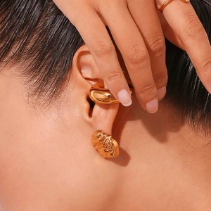 18K gold plated stainless steel heart texture earrings and ear cuff on female model