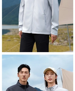 Detail of waterproof softshell hiking jacket with windproof collar in outdoor scene