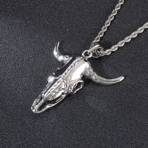 Punk style stainless steel bull skull pendant necklace with twisted chain on black background