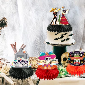 Décorations Jour des Morts avec centres de table en nid d'abeille et cake topper coloré
