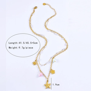 Detail showing shell star charms and pearl beads on a layered necklace with dimensions
