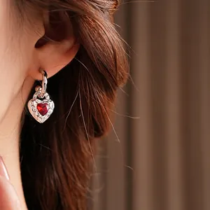 Elegant silver heart earrings with red gemstone and vintage baroque relief style