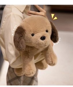 Detailed view of soft plush shiba inu toy held to show its fluffy texture and size