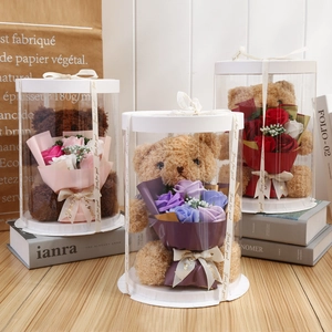 Detail of soap flower teddy bear gift boxes with Just for you ribbons in transparent packaging
