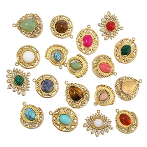 Macro detail of French water drop natural stone pendants in gold stainless steel