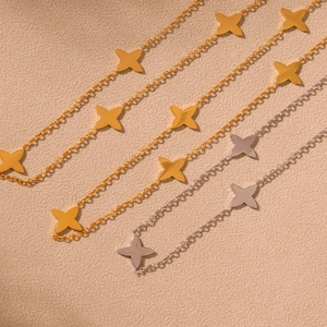 Gold and silver stainless steel clover necklaces featuring 5A cubic zirconia stones