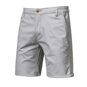 Detail of light gray cargo shorts featuring elastic waist and cotton twill texture