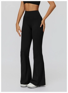 Detail of high waisted black flared yoga pants with high-stretch fabric and slim fit design