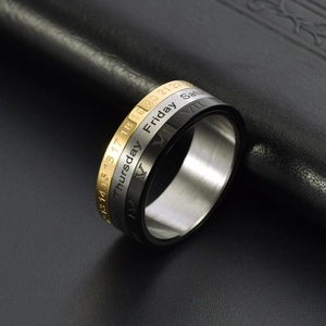 Three-color rotatable calendar ring in stainless steel with Roman numerals and day display