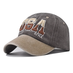 Detail of USA 3D embroidery on washed cotton charcoal baseball cap with khaki brim