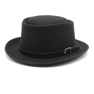 Detailed view of black wool felt pork pie hat featuring a leather strap with silver buckle