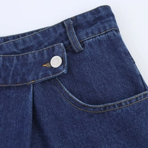 Jean femme taille haute coupe droite ample en denim bleu foncé avec coutures jaunes