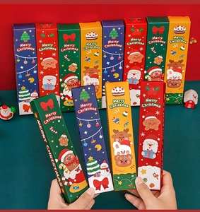 Close-up of colorful Merry Christmas stationery blind boxes with cartoon illustrations