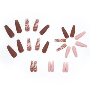 Long coffin press-on nails set in chocolate brown and marble pattern with rhinestones