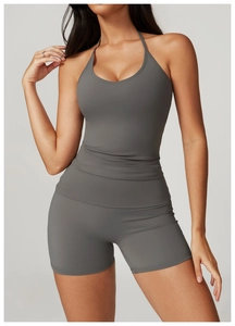 Detail of dark grey halter sports top and high-waisted shorts with high-stretch dry fabric