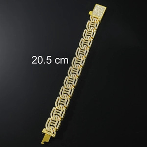 Close-up of a 20.5 cm gold iced out Cuban link bracelet with sparkling cubic zirconia