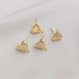Detail of 14K gold filled 3D heart stud earrings with loop for DIY jewelry making
